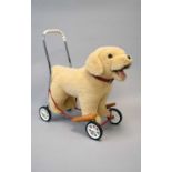 A late 20th century ride-on plush Labrador dog