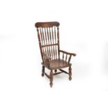 A 19th century oak and elm spindle-back elbow chair