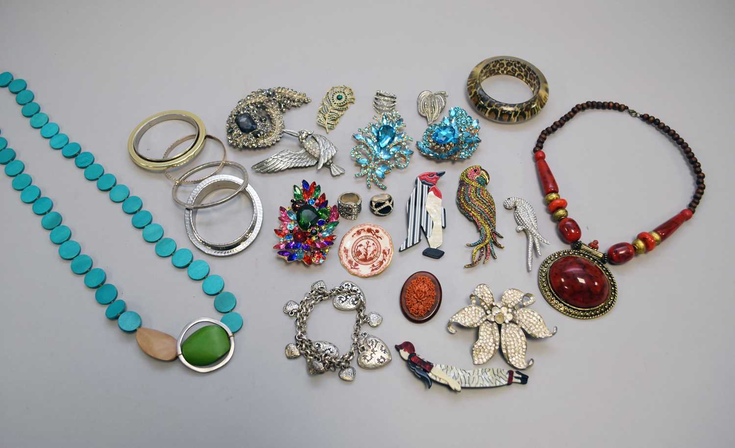 A large collection of various pieces of costume jewellery