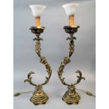 A pair of cast metal table lamps, contemporary