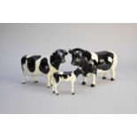 Beswick Friesian cattle family group