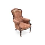 A Victorian mahogany upholstered armchair