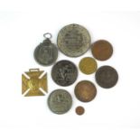 A collection of ten medallions and tokens