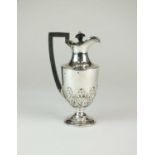 A Victorian silver hot water jug