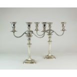 A pair of silver candelabra