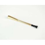 A 9ct gold cheroot/cigarette holder