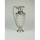 A George V silver mounted glass claret jug