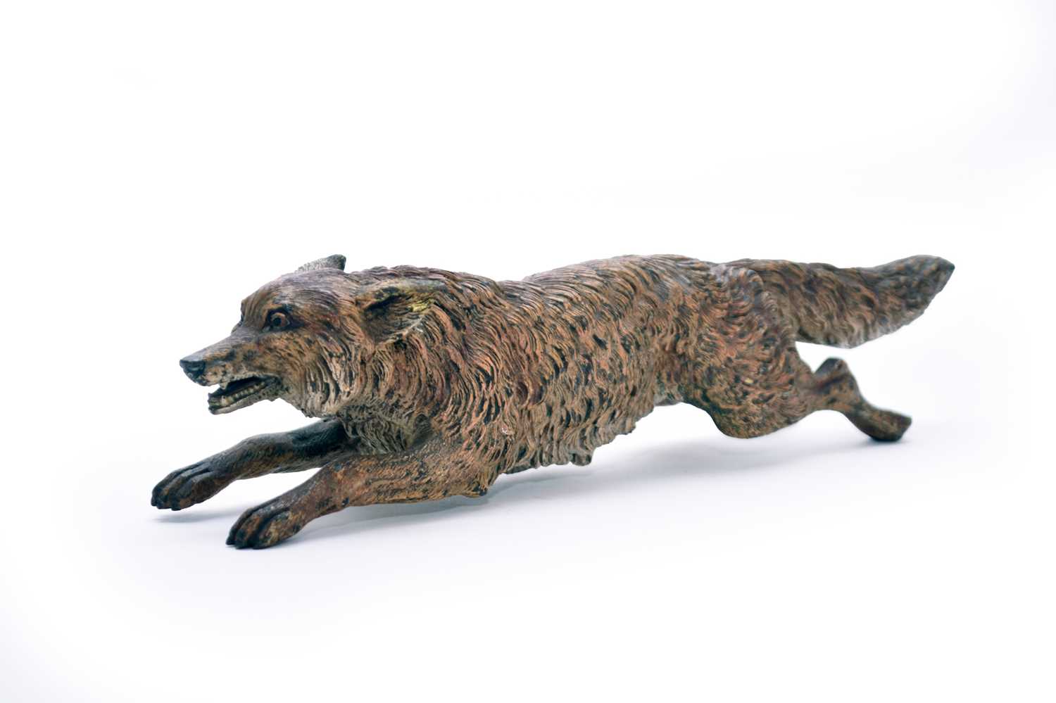 An Austrian cold painted bronze figure of a running fox