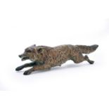 An Austrian cold painted bronze figure of a running fox