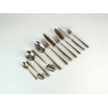 A twelve setting canteen of George Butler stainless steel gold highlight cutlery