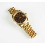 An 18ct gold mid-size Rolex Oyster Perpetual Datejust Superlative Chronometer wristwatch