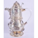 A RARE ARTS AND CRAFTS SILVER JEWELLED PRISM CUT JUG with beast spout, decorated with Viking boats a