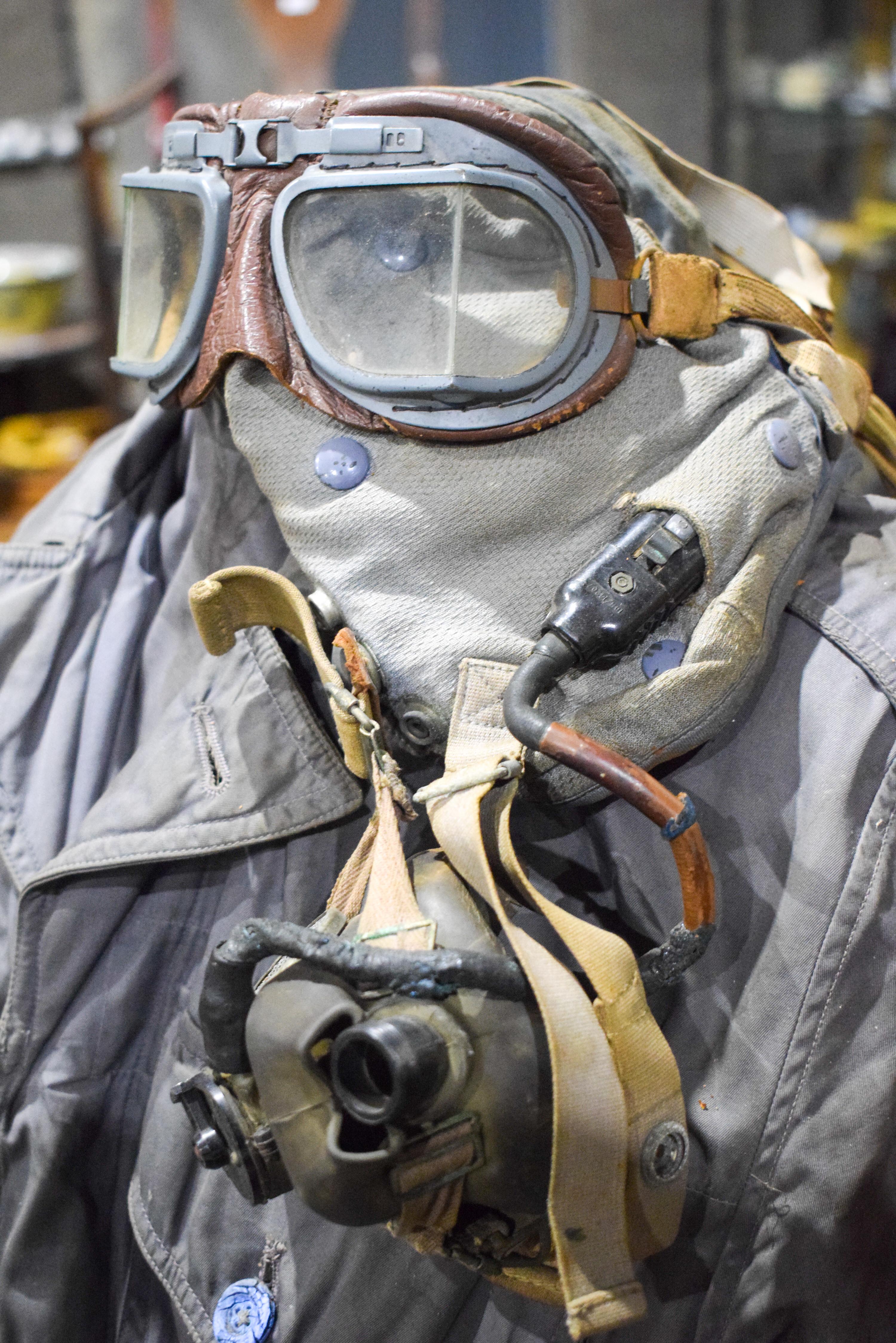 A MILITARY ISSUE FLYING SUIT & GOGGLES together with linen boxes, a cartridge carrier, American issu - Image 3 of 14