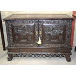 A 19TH CENTURY CHINESE HONGMU HARDWOOD RECTANGULAR STANDING CABINET the doors decorated with panels