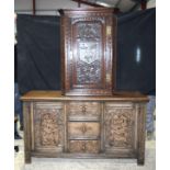 AN OAK TUDOR STYLE BUFFET with matching stool, desk stand and similar hanging oak corner cupboard. B