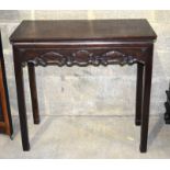 A 19TH CENTURY CHINESE HONGMU HARDWOOD RECTANGULAR ALTAR TABLE Qing, carved with central triple clou