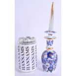 AN ANTIQUE BOHEMIAN BLUE OPALINE GLASS SCENT BOTTLE AND STOPPER painted with flowers. 24.5 cm high.