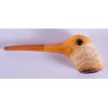 A RARE 19TH CENTURY CARVED MEERSCHAUM AND AMBER PIPE formed as a wood pecker. 16 cm wide.