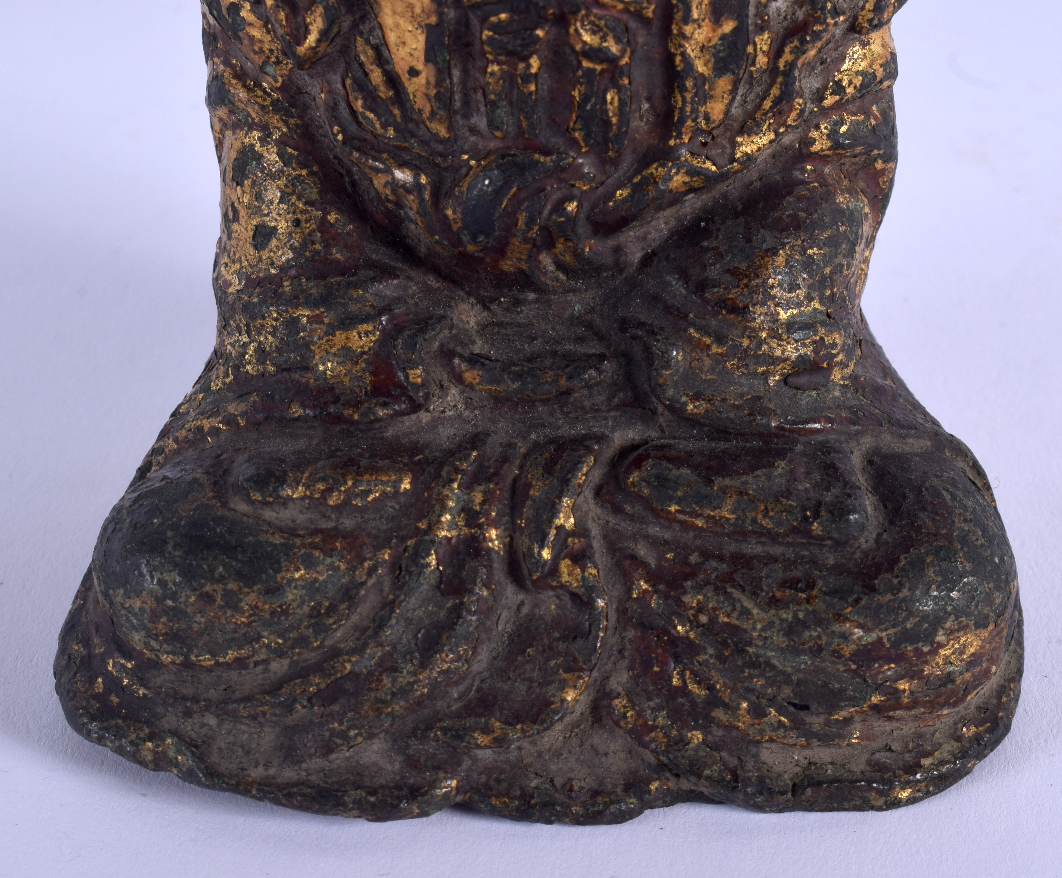 A 17TH CENTURY CHINESE POLYCHROMED CAST IRON FIGURE OF GUANYIN Ming, modelled seated with hands clas - Image 3 of 6