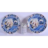 A PAIR OF EARLY 18TH CENTURY ENGLISH DELFT TIN GLAZED FAIENCE DISHES C1730 painted with a boy in a w