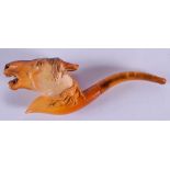 A RARE 19TH CENTURY CARVED MEERSCHAUM AND AMBER PIPE formed as horses head. 17 cm wide.