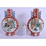 A VERY RARE PAIR OF 19TH CENTURY CHINESE TWIN HANDLED PORCELAIN MOON FLASKS Kangxi Style, enamelled