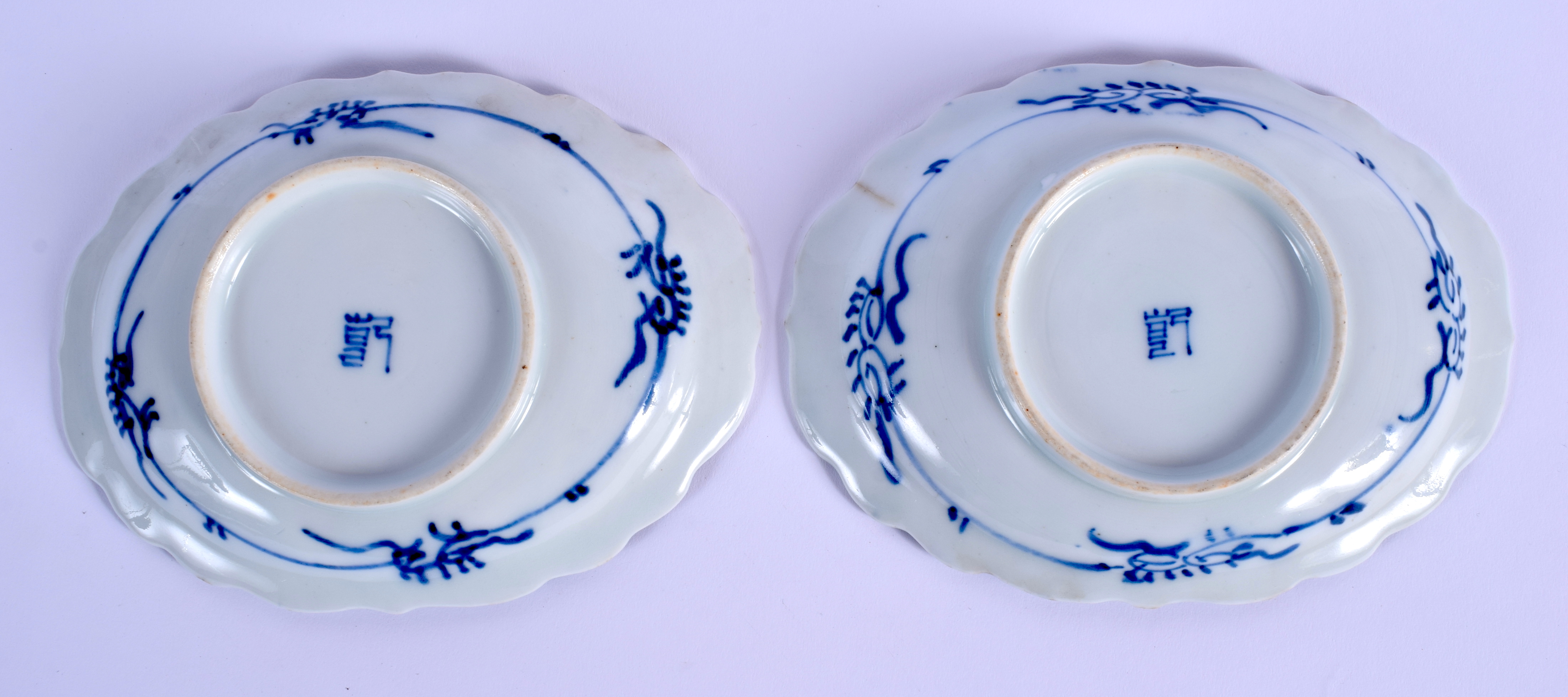 A PAIR OF 19TH CENTURY CHINESE BLUE AND WHITE DISHES bearing Qianlong marks to base. 16 cm x 12 cm. - Image 2 of 2