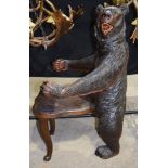 A VERY RARE 19TH CENTURY BAVARIAN BLACK FOREST CARVED WOOD CHAIR modelled as a standing brown bear w