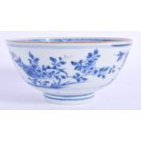 A 17TH/18TH CENTURY CHINESE BLUE AND WHITE PORCELAIN BOWL Kangxi/Yongzheng, painted with a bird in f