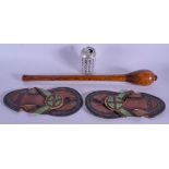 A 1950S CARVED WOOD EXERCISE JUGGLING STICK together with an unusual pair of Continental leather sho