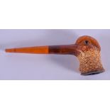 A RARE 19TH CENTURY CARVED MEERSCHAUM AND AMBER PIPE formed as a wood pecker. 17 cm wide.