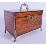 A GEORGE III MAHOGANY SILVER MOUNTED RECTANGULAR TEA CADDY overlaid with acanthus, the feet formed f