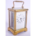 A FRENCH BRASS CARRIAGE CLOCK Raingo Freres Paris. 14 cm high inc handle.