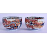A PAIR OF 18TH CENTURY JAPANESE EDO PERIOD IMARI BOWLS painted with foliage and landscapes. 8.25 cm