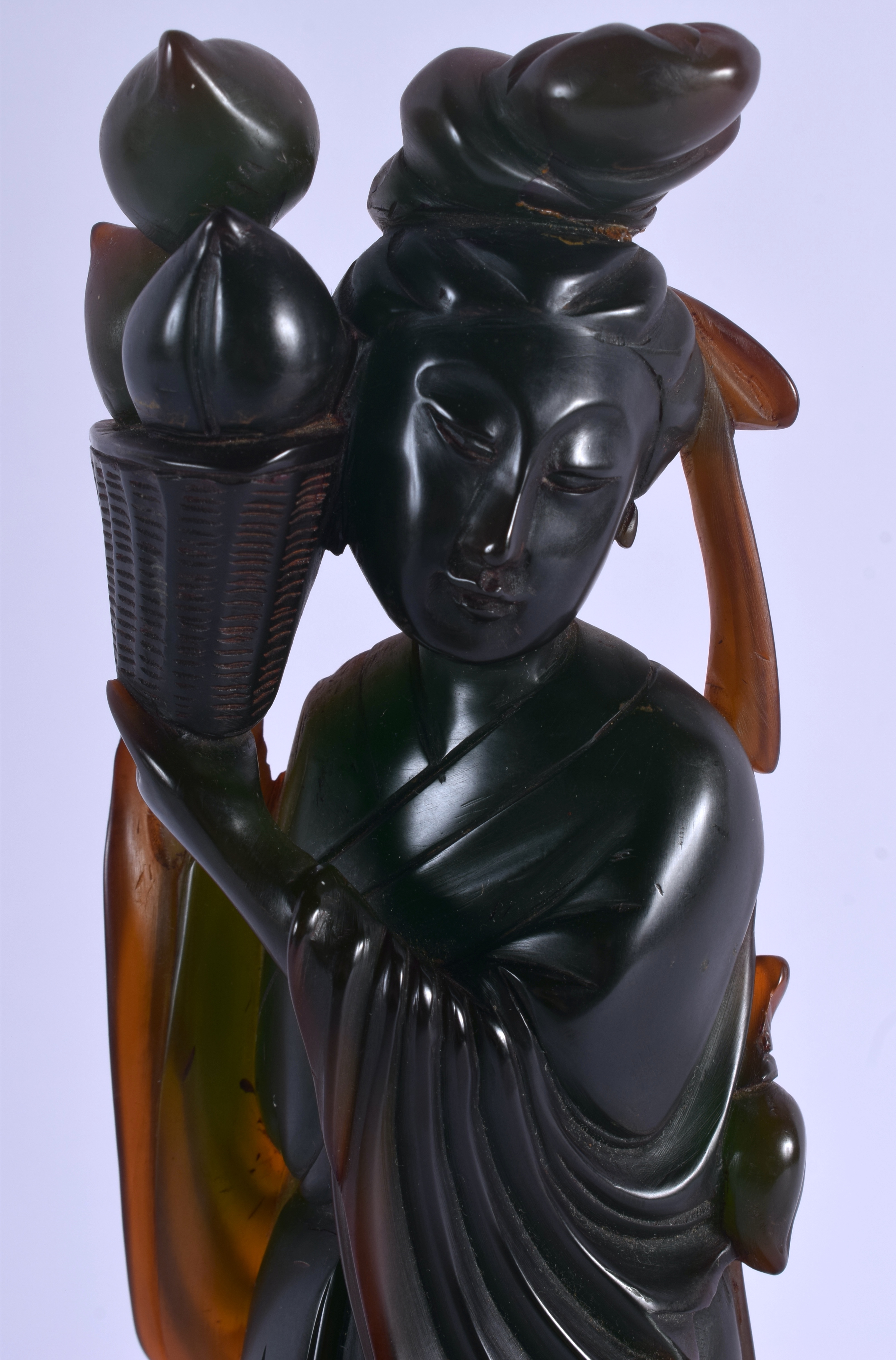 AN EARLY 20TH CENTURY CHINESE CARVED HORN FIGURE OF A FEMALE Late Qing, modelled as an immortal hold - Image 2 of 3