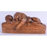 A 19TH CENTURY CONTINENTAL CARVED FRUIT WOOD FIGURE OF THE LUCERNE LION modelled resting upon armour
