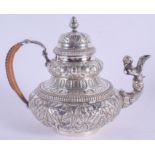 A 19TH CENTURY DUTCH SILVER TEAPOT AND COVER possibly after an 18th century design by Jan De Vries (