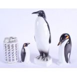 A HOLLOHAZA KING PENGUIN together with two others. Largest 27 cm high. (3)