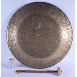 A RARE 19TH CENTURY CHINESE POLISHED BRONZE GONG Qing, decorated with a bold imperial five claw drag
