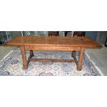 A LARGE ANTIQUE TWO PLANK FRUITWOOD FARMHOUSE TABLE with bold column supports. 250 cm x 90 cm x 80 c