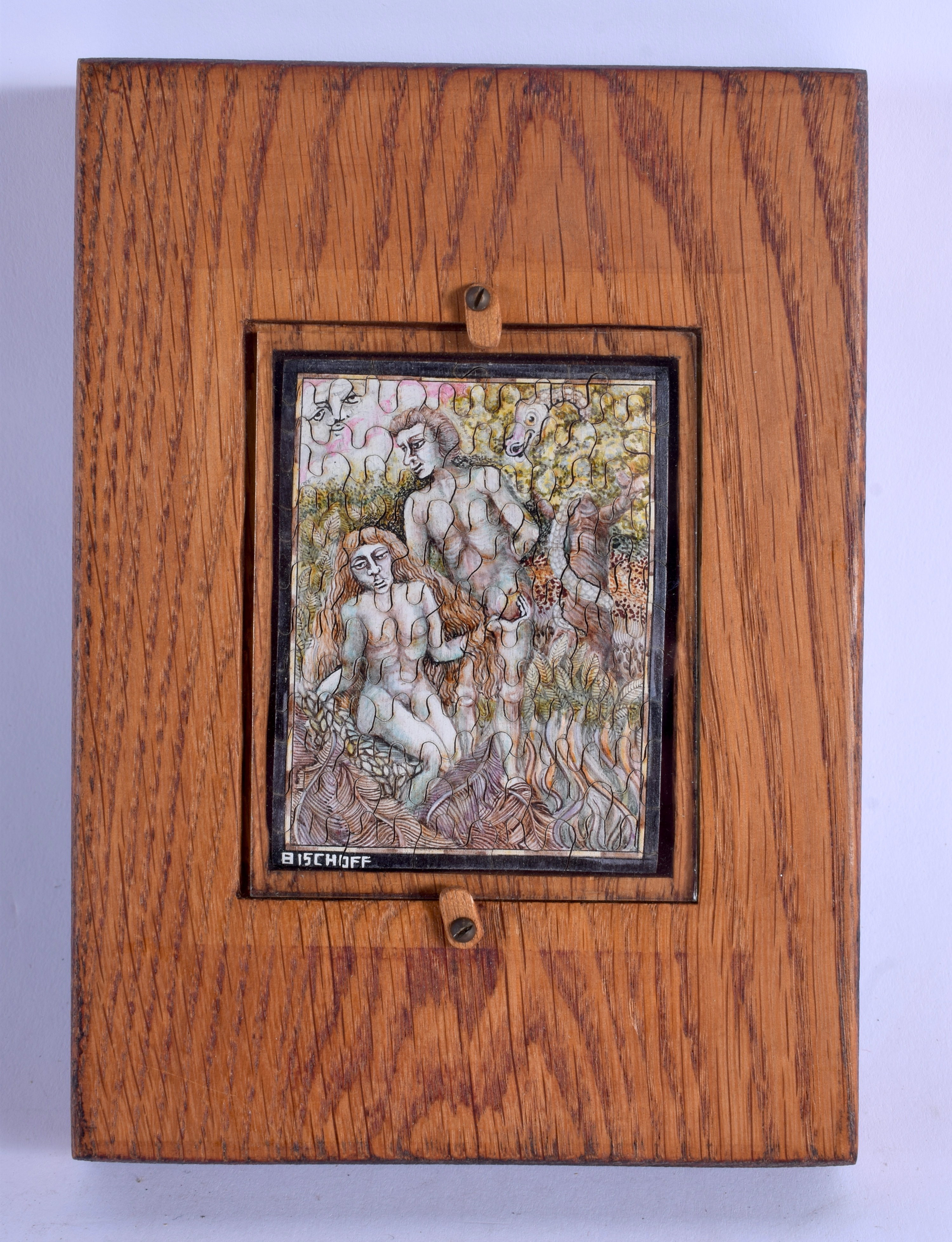 AN UNUSUAL FRAMED FRANZ BISCHOFF PUZZLE representing Adam and Eve. Puzzle 8 cm x 6 cm.