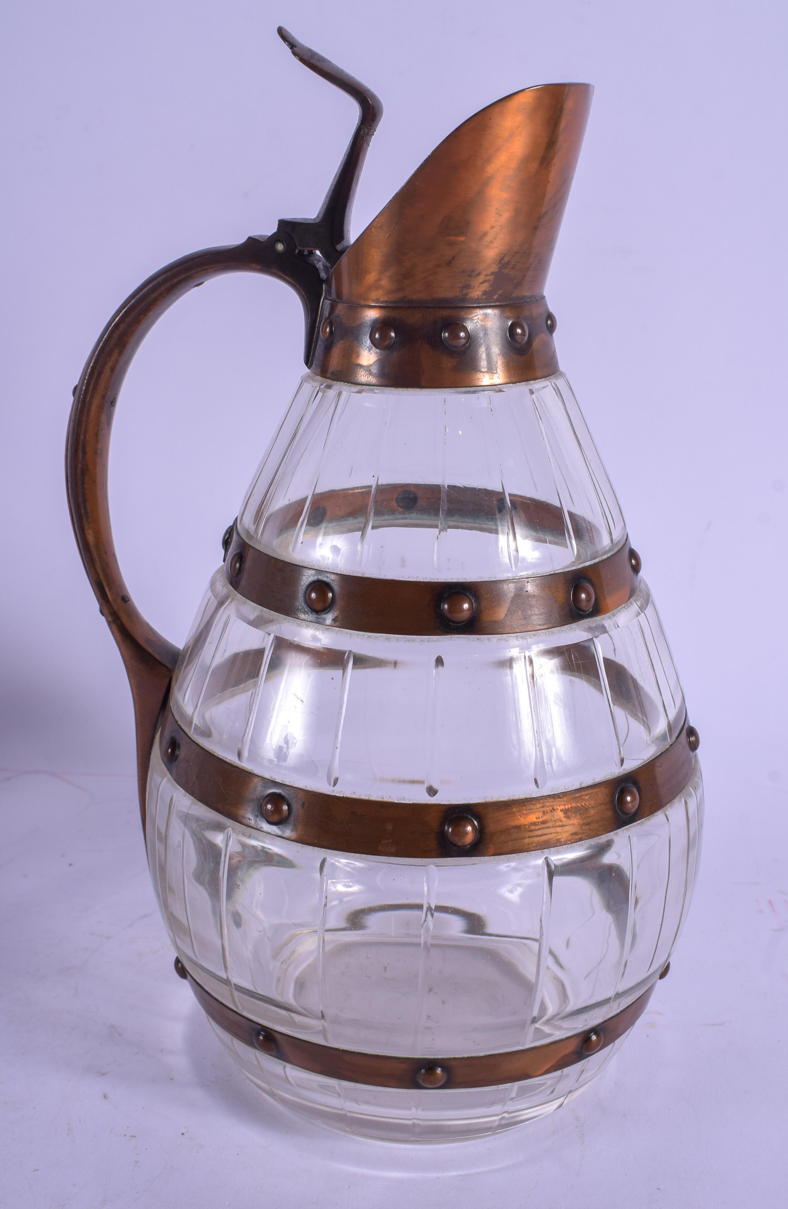 AN ARTS AND CRAFTS COPPER AND CRYSTAL GLASS WHISKEY DECANTER of barrel form. 24.5 cm high. - Image 3 of 4