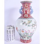 A RARE EARLY 20TH CENTURY CHINESE RUBY GROUND TWIN HANDLED PORCELAIN VASE Late Qing/Republic, bearin