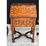 AN EARLY 18TH CENTURY DUTCH WALNUT AND FLORAL MARQUETRY VENEERED BUREAU ON STAND with fall front and