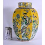 A 19TH CENTURY CHINESE FAMILLE VERTE PORCELAIN GINGER JAR AND COVER painted with birds upon a rich y