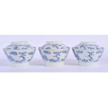 THREE 18TH/19TH CENTURY KOREAN BLUE AND WHITE PORCELAIN BOWLS AND COVERS painted with dragons and cl