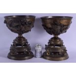 A LARGE PAIR OF 19TH CENTURY JAPANESE MEIJI PERIOD BRONZE VASES ON STANDS with unusual silver and go