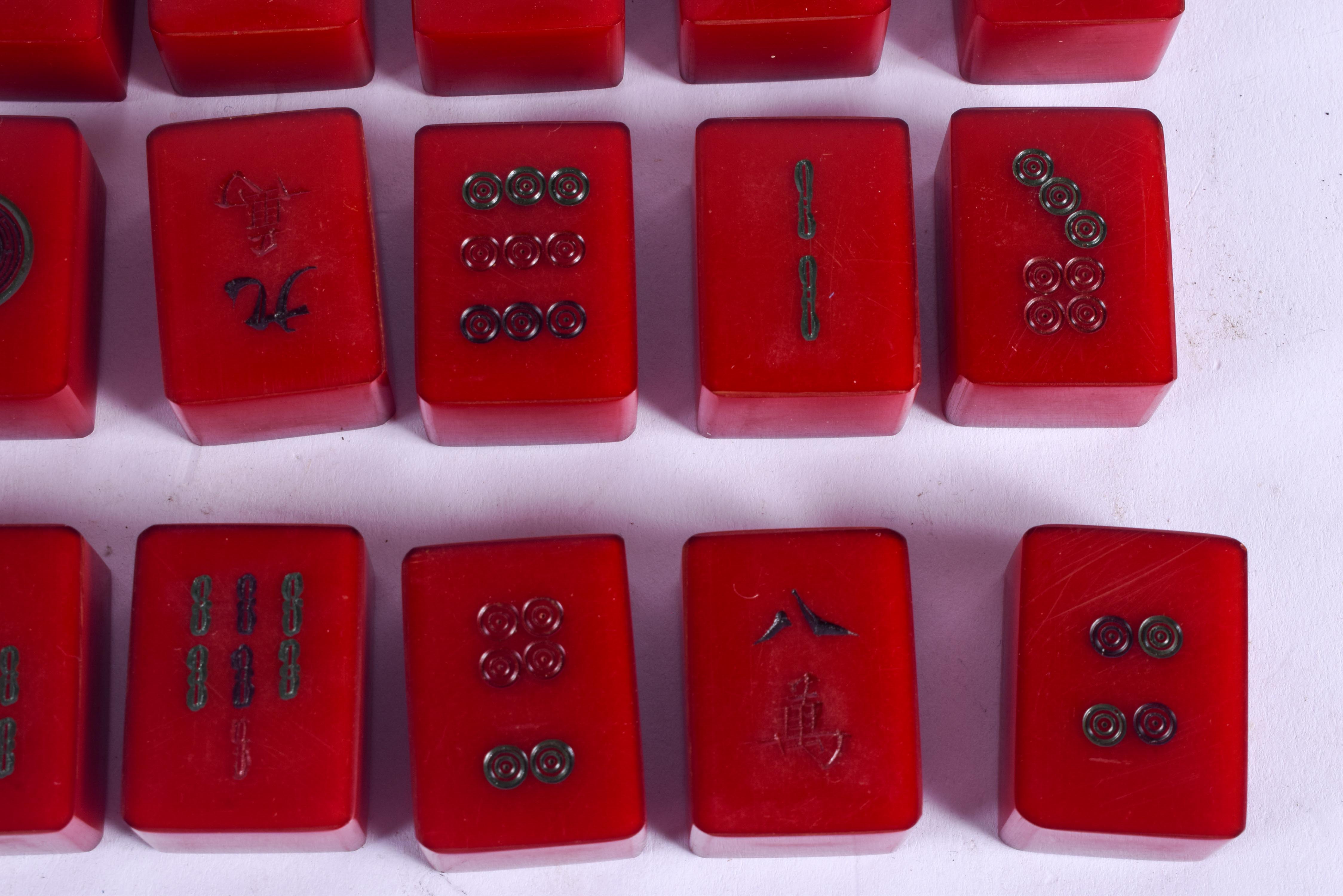 A RARE SET OF ART DECO CATALIN BAKELITE MAH-JONG SET of cherry red colour. (76 pieces) - Image 4 of 6