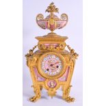 A FINE 19TH CENTURY FRENCH ORMOLU AND PORCELAIN MANTEL CLOCK with lion paw feet, painted with portra