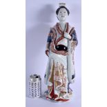 A LARGE EARLY 18TH CENTURY JAPANESE EDO PERIOD IMARI FIGURE OF A FEMALE BEAUTY modelled in drapes ro